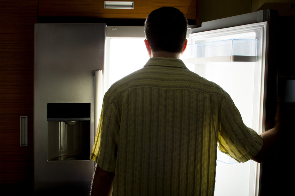 Bachelor Looking For Food in a Fridge